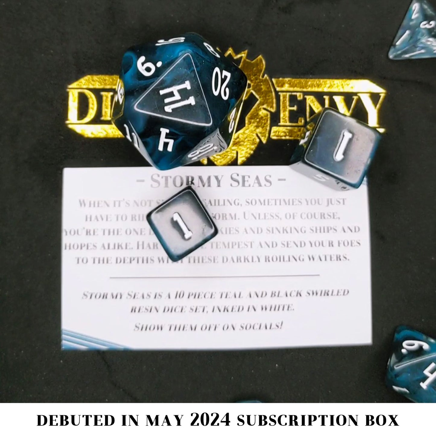 Stormy Seas is a 10-piece set with teal and black vapor suspended in clear resin, inked in white.