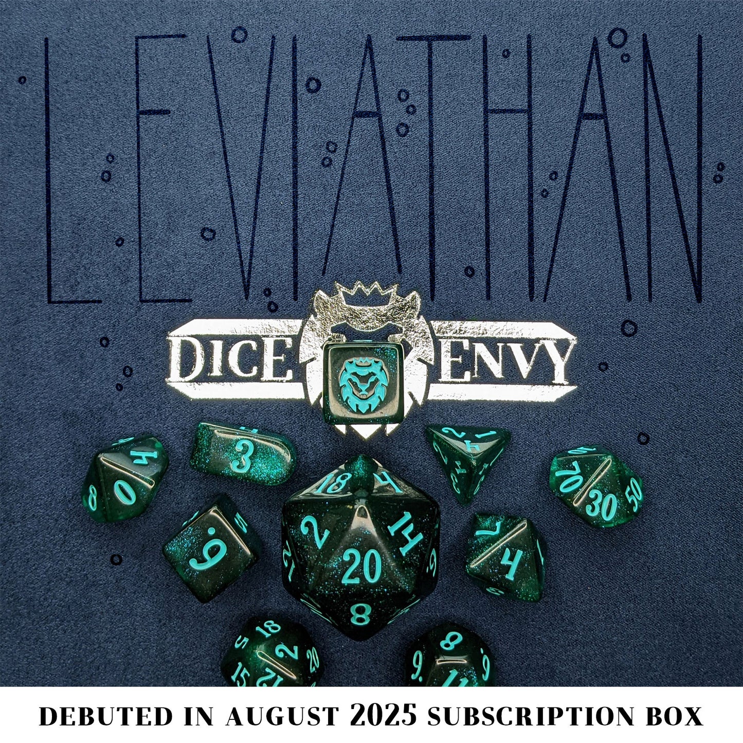 Leviathan is a 10-piece set of dark teal acrylic dice, filled with glistening blue glitter and inked in seafoam green.