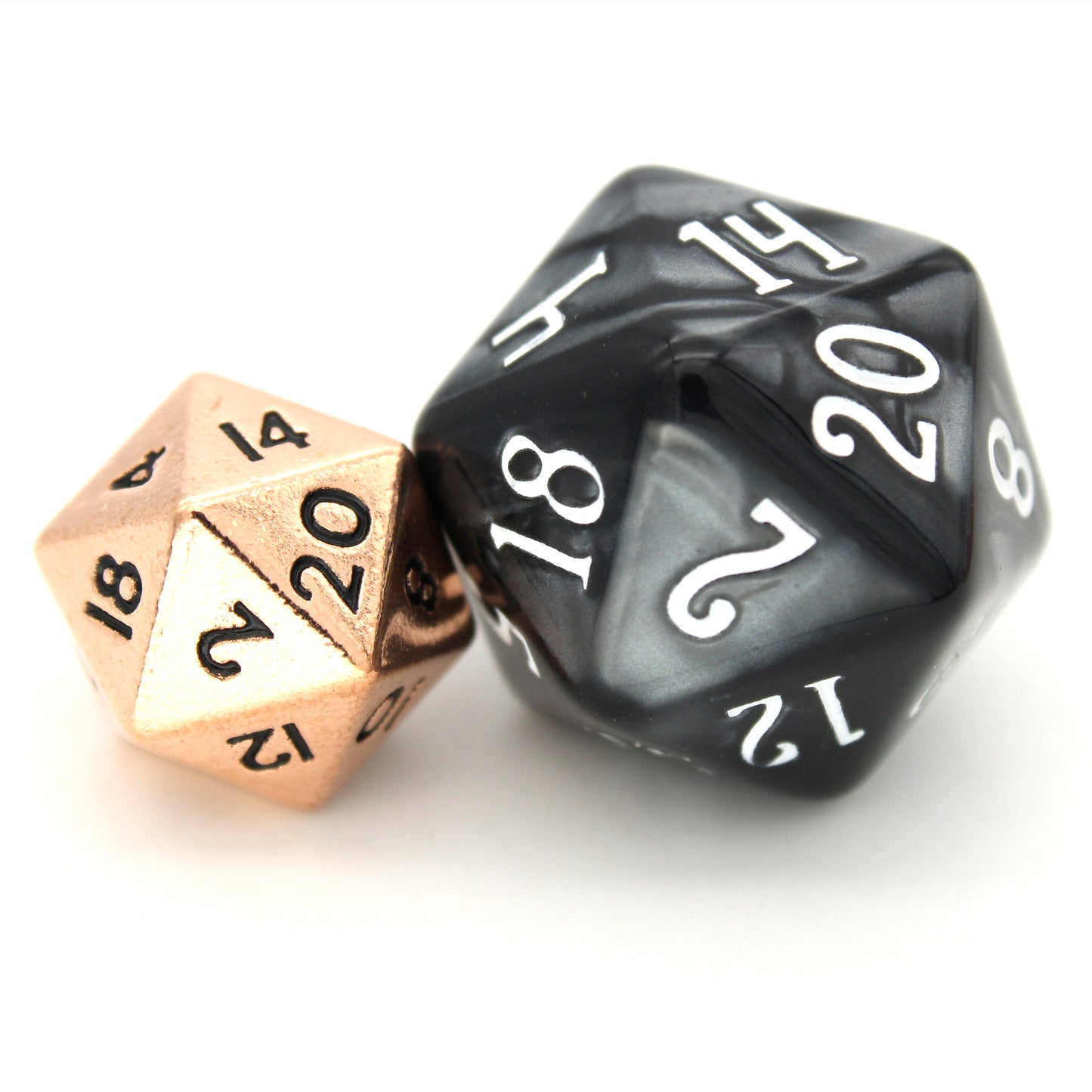 Brats is a 7-piece set of shiny rose gold 10mm metal dice.