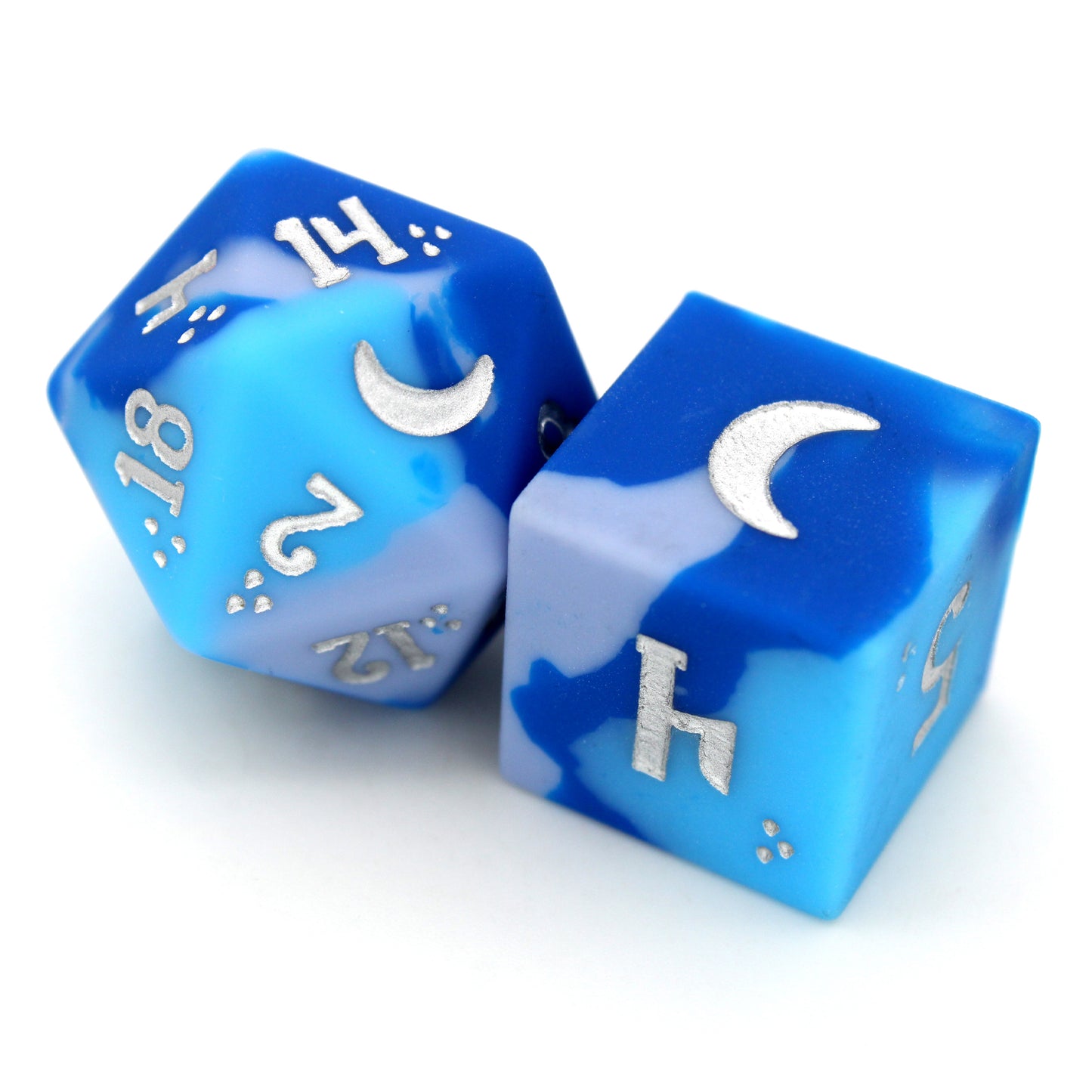 Chaotic Neutral is an 8-piece, swirled silicone dice set in bright blues and greys. It features a moonlit silver ink design.