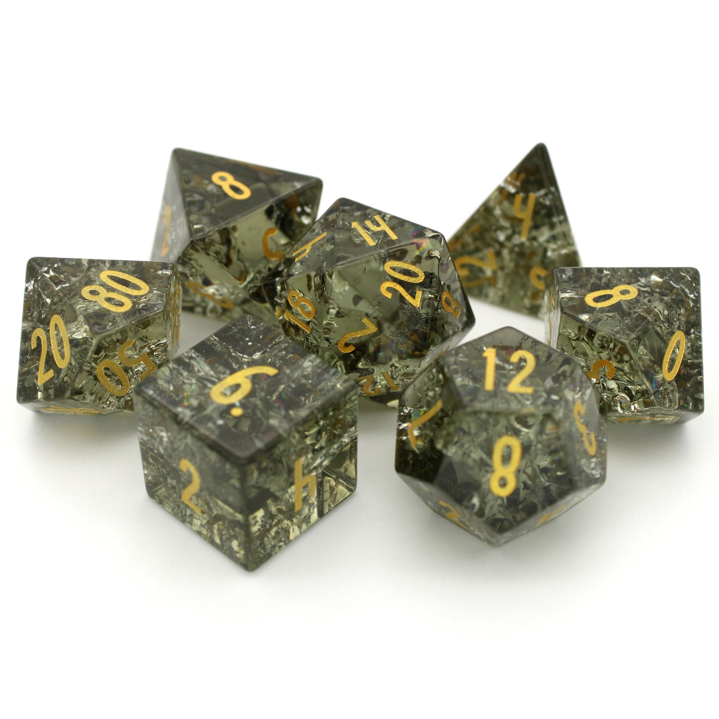Circle Of Spores is a 7-piece, mossy green crystal set inked in gold.