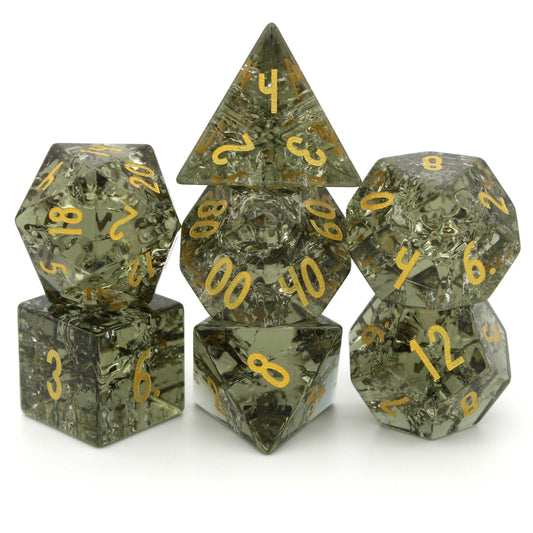 Circle Of Spores is a 7-piece, mossy green crystal set inked in gold.