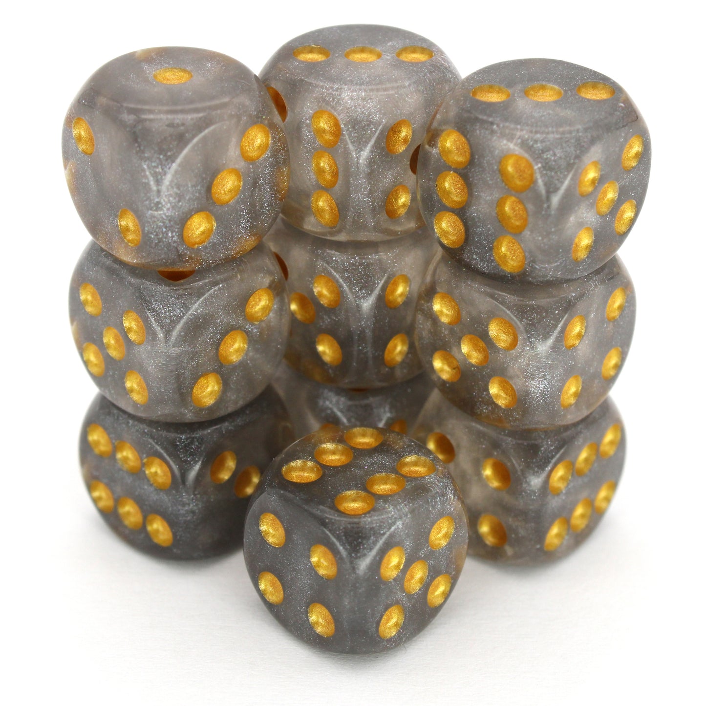 Daybreak is a 10-piece set of shimmering slivery-grey 12mm d6s, with pips inked in gold. They are part of our Pip-Squeaks collection.