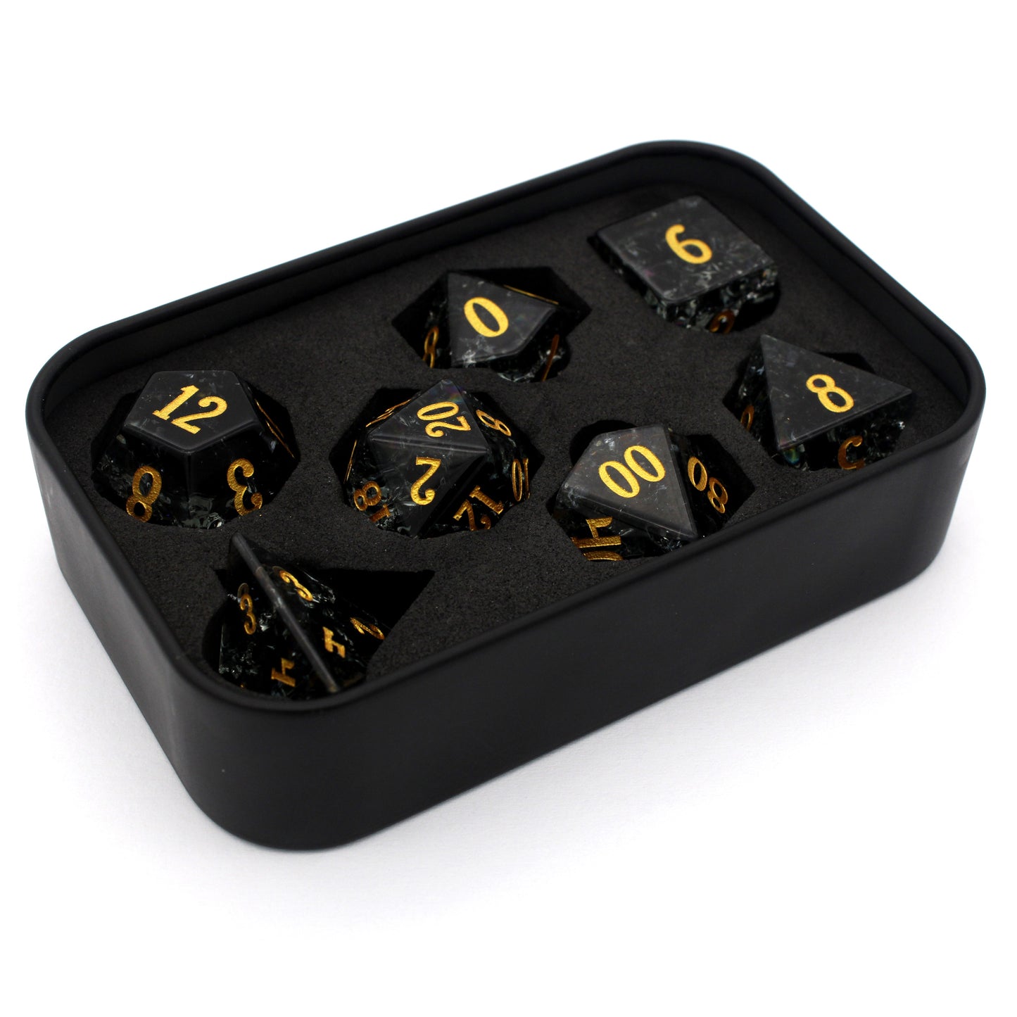 Midnight Sparkle is a 7-piece set of navy gray crystal dice with a crackle effect and gold numbering.