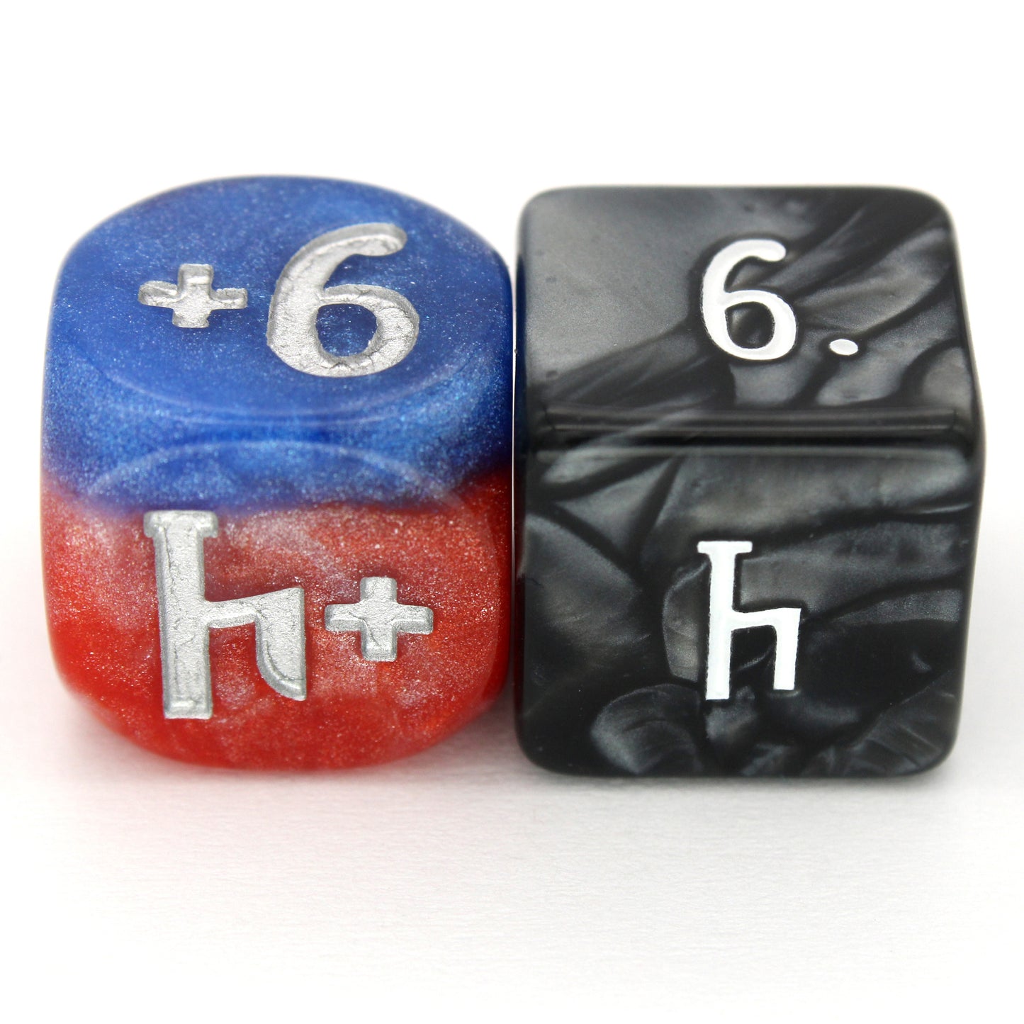 Magic Guild Counters - Copy & Create are a 5-piece set of 16mm, layered blue and red d6 dice for use with Magic the Gathering, available in positive and negative and inked in silver.