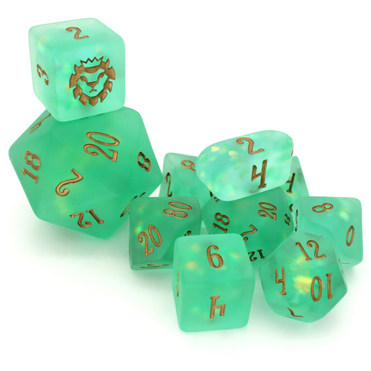 Sea Shanties is a 10-piece set of ocean green resin with magical iridescent scale inclusions and bronze ink.