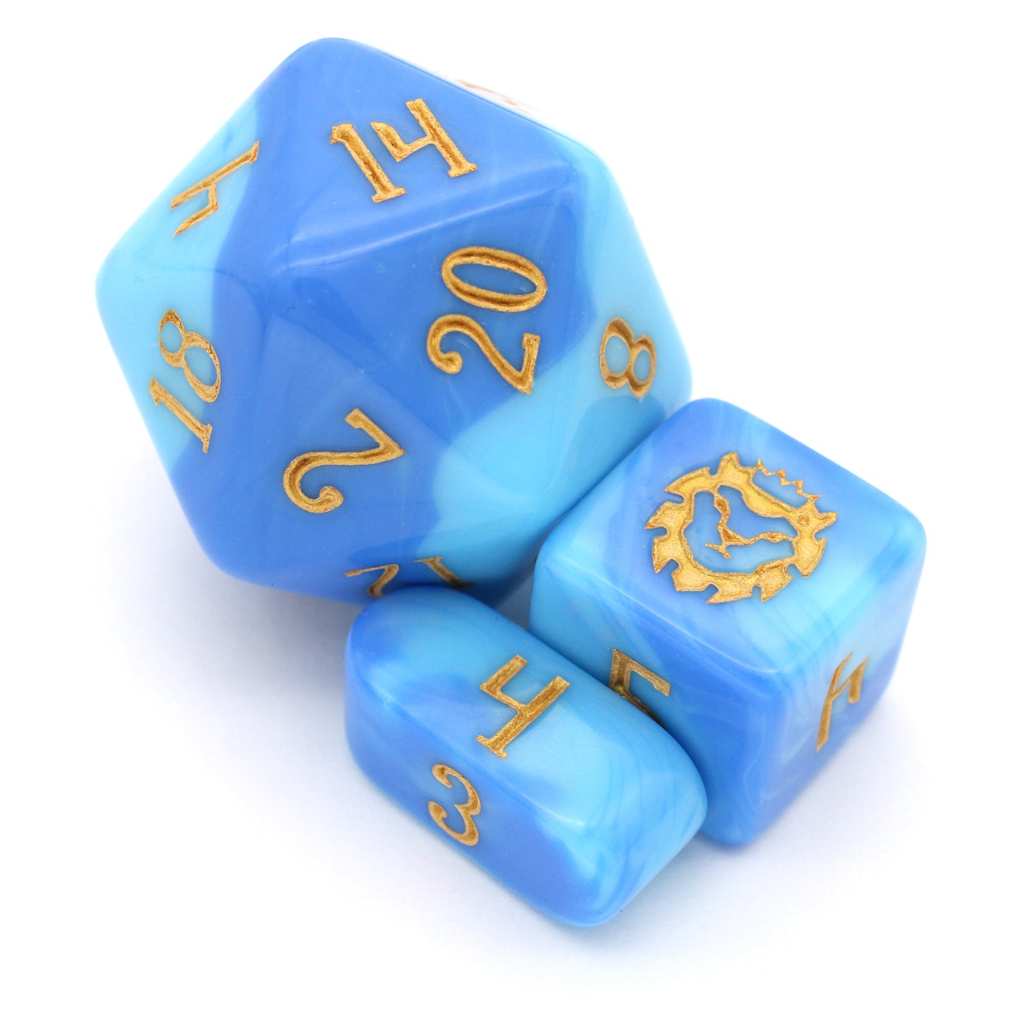 Shape Water is a 10-piece acrylic dice set with swirled shades of blue, inked in beach sand yellow.