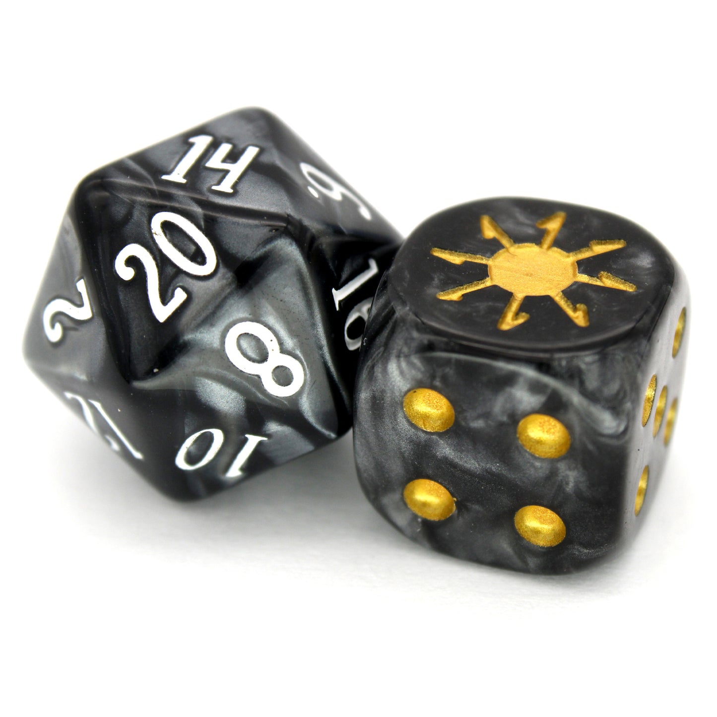 War Chaos (Dark) is a 10-piece set of 16mm polymer d6s in heavy metal blacks, with pips and burst engraving in gold ink. It is part of our Fantasy Squads series of dice for miniature wargaming.