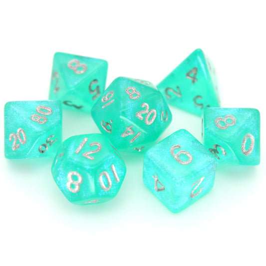 Cyantidote is a 7-piece 13mm semi-translucent glittery aqua resin dice set, inked in silver. It belongs to our tiny but mighty Wee Lads collection.