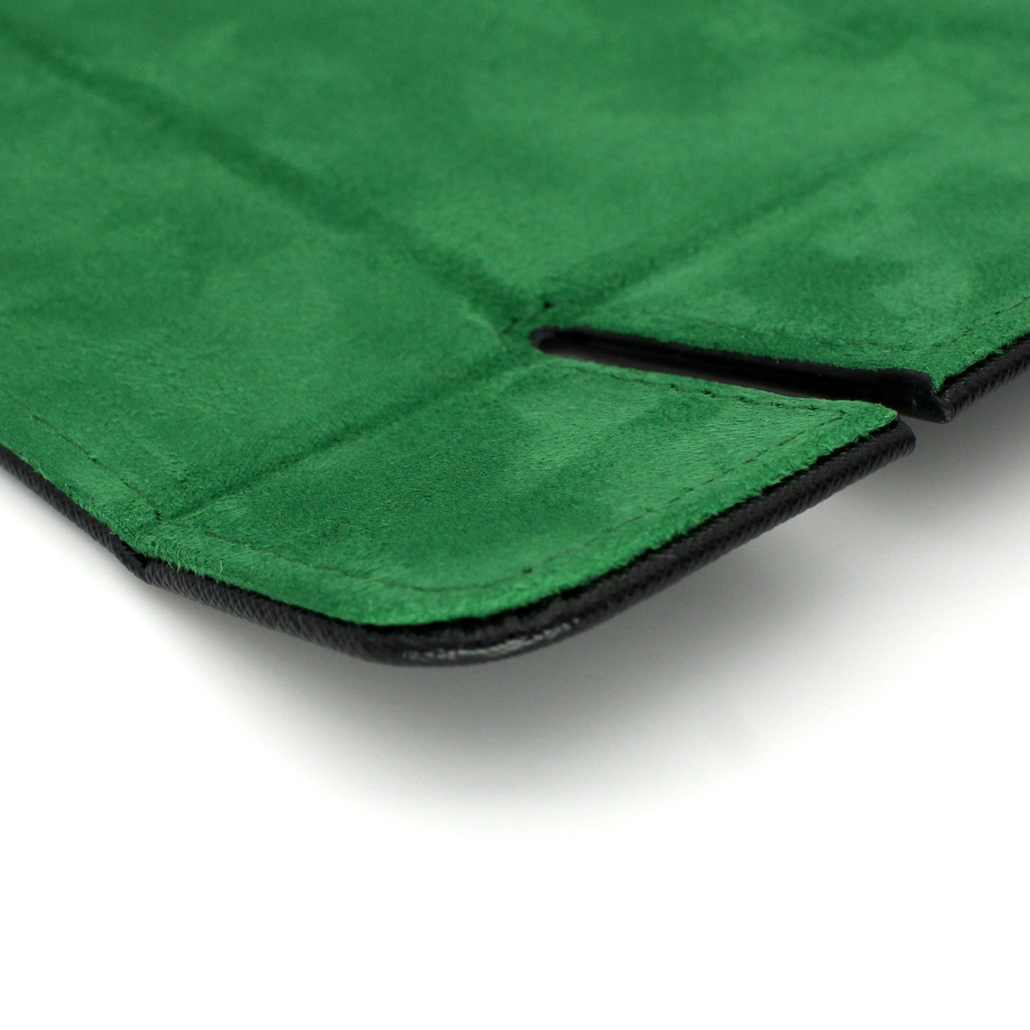 Made of vegan leather and microsuede, our dice trays have hidden magnets that hold them together and are available in druid green, warlock purple, barbarian tan, rogue red, and necromancer black.