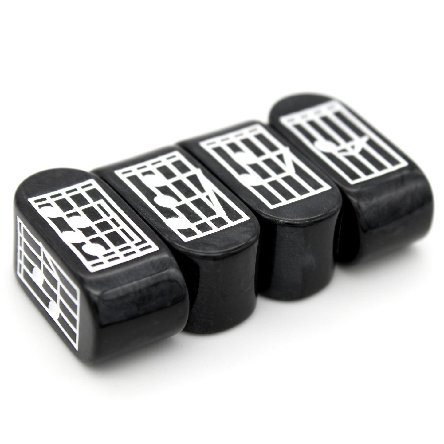 Dark and secretive, Nocturne Infinity d4s are made of classy black resin and feature white music notes supported on a white staff.