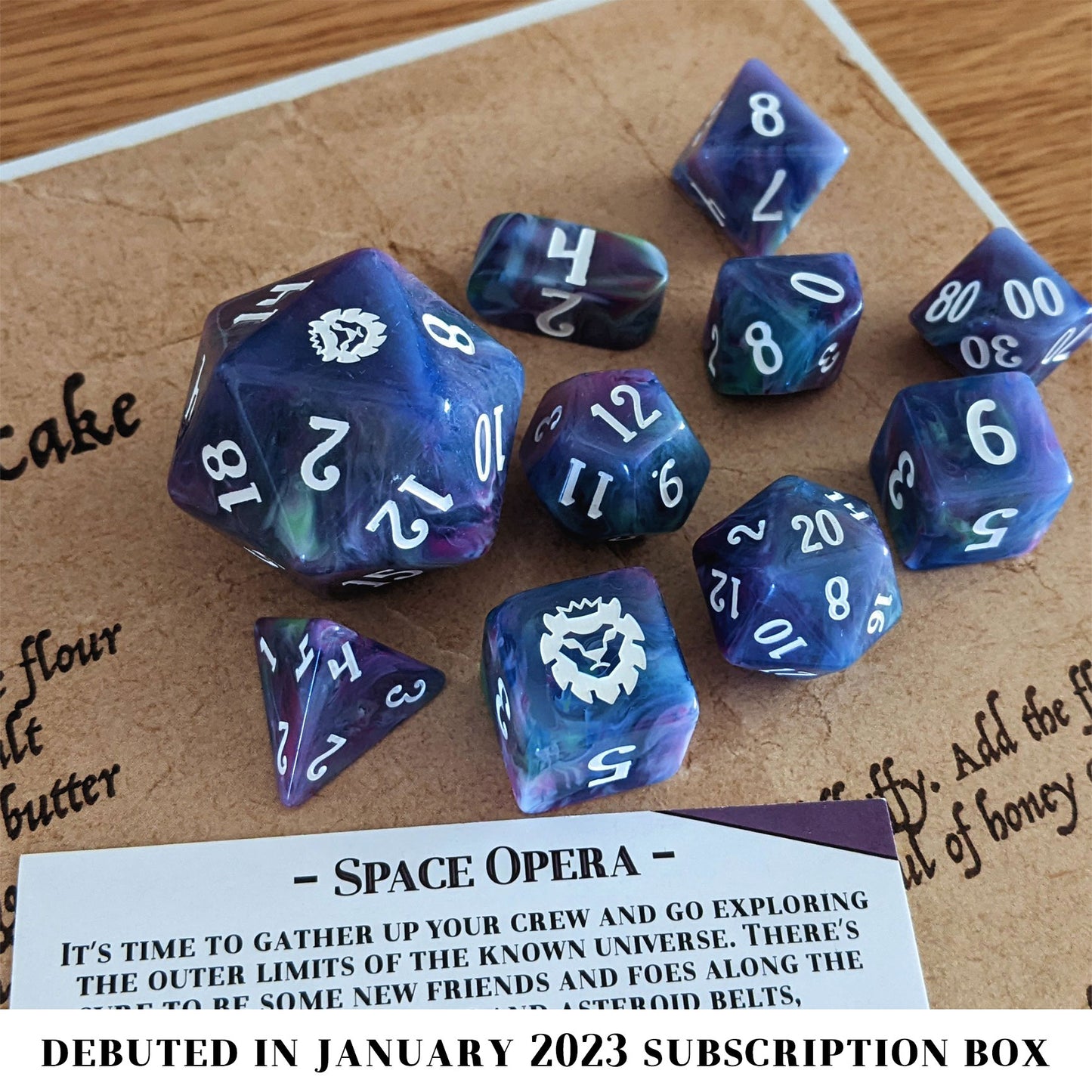 Space Opera is a 10-piece set of swirled purple, green, and blue resin, inked in starry white.
