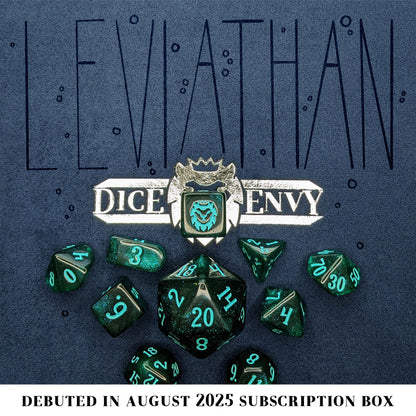 Leviathan is a 10-piece set of dark teal acrylic dice, filled with glistening blue glitter and inked in seafoam green.