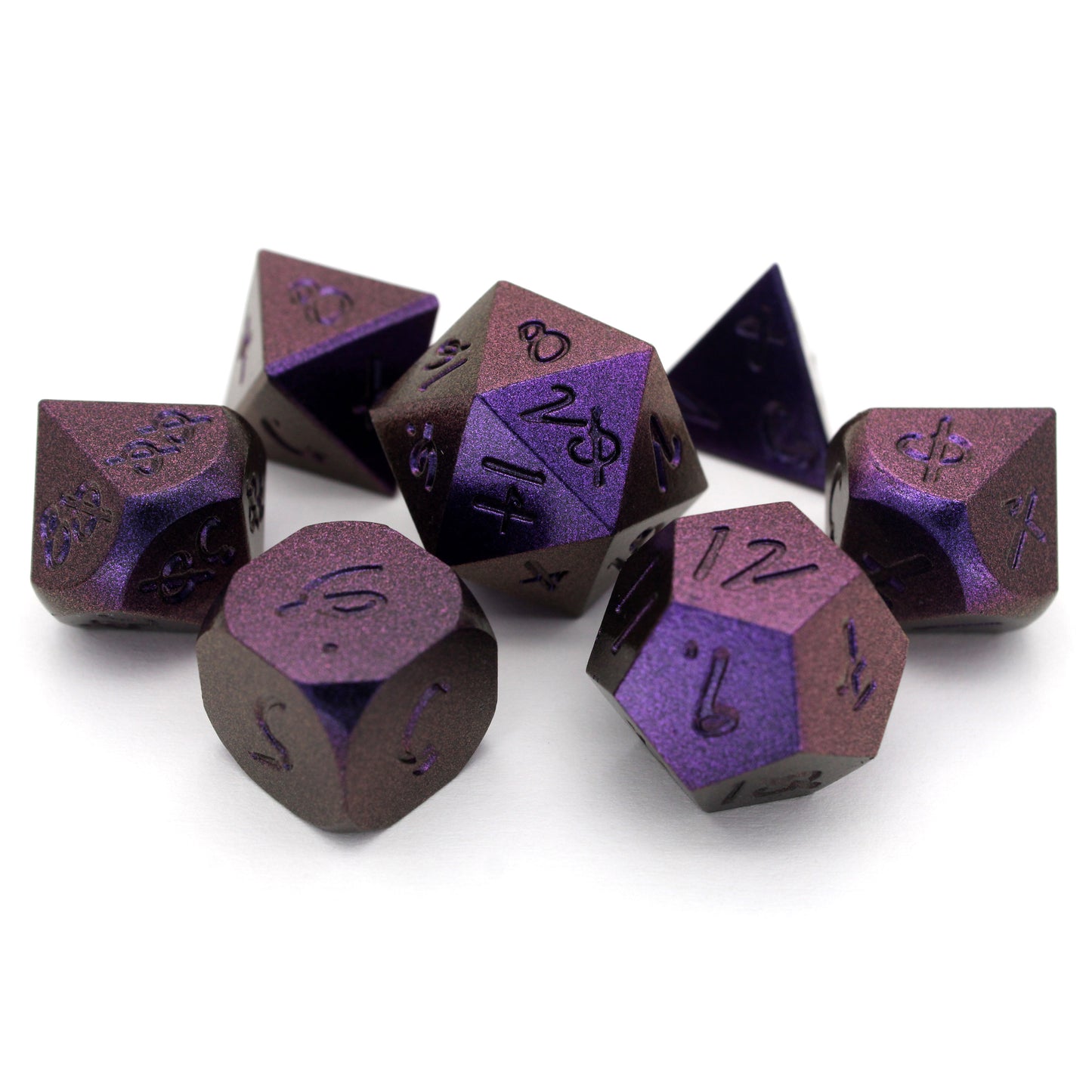 Mage Hand Arcane Trickster is a 7-piece, purple metal set featuring Aabria Iyengar's handwritten numbers.