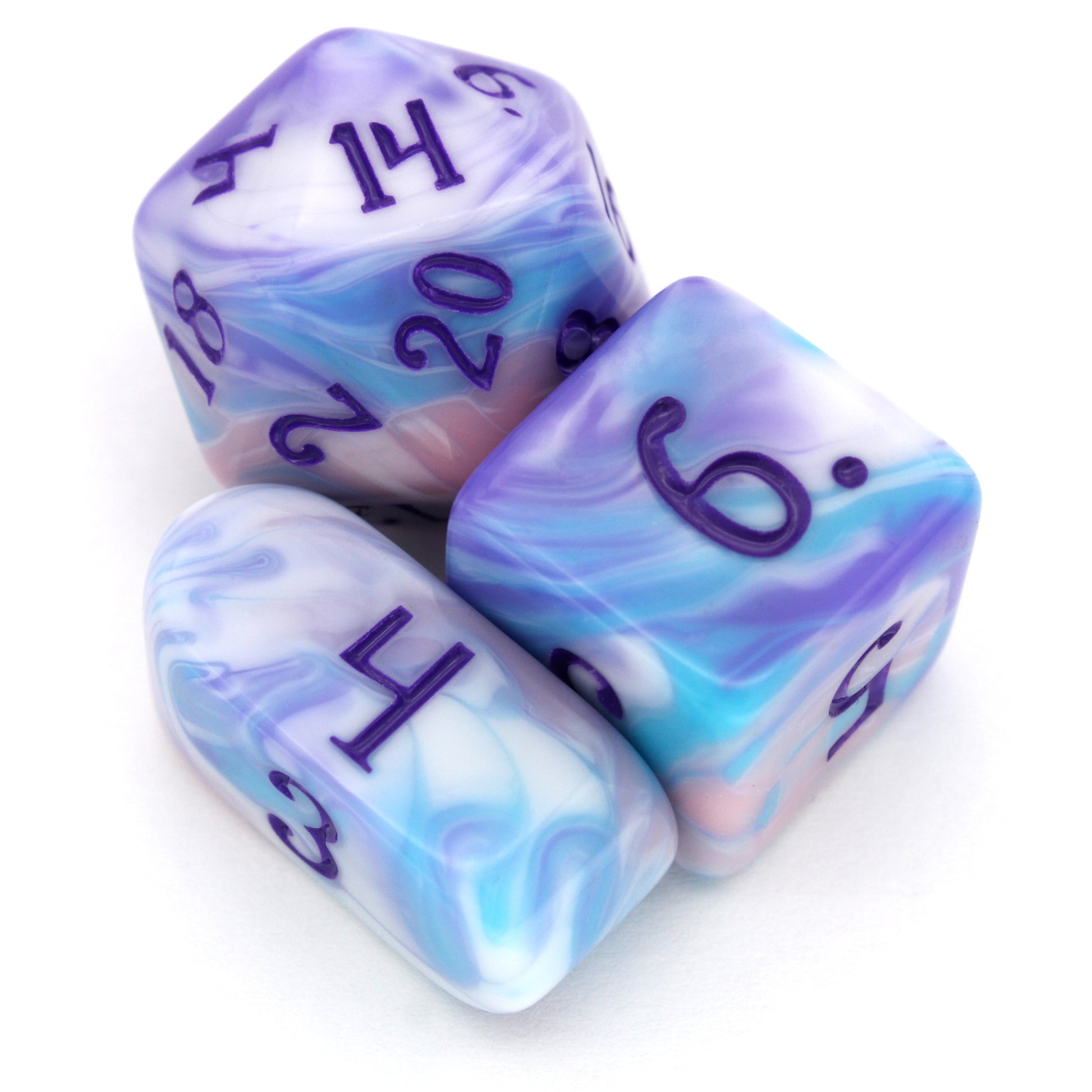 Accursed Confections is a 10-piece set of swirled acrylic dice in sugary blue, pink, purple, and white with dark purple ink.