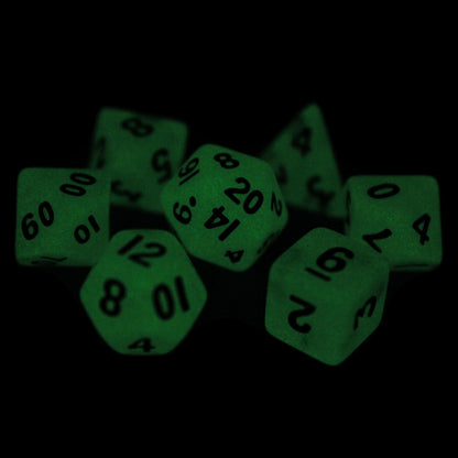 Acid Rain is a 7-piece 13mm semi-opaque resin dice set, inked in black.