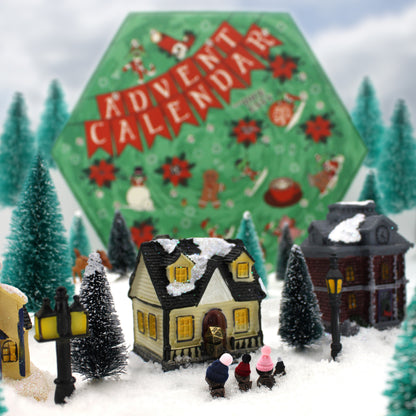 Each Dice Envy Advent Calendar is a 14" wide perforated calendar with over 30 exclusive TTRPG dice, including full sets and single dice!