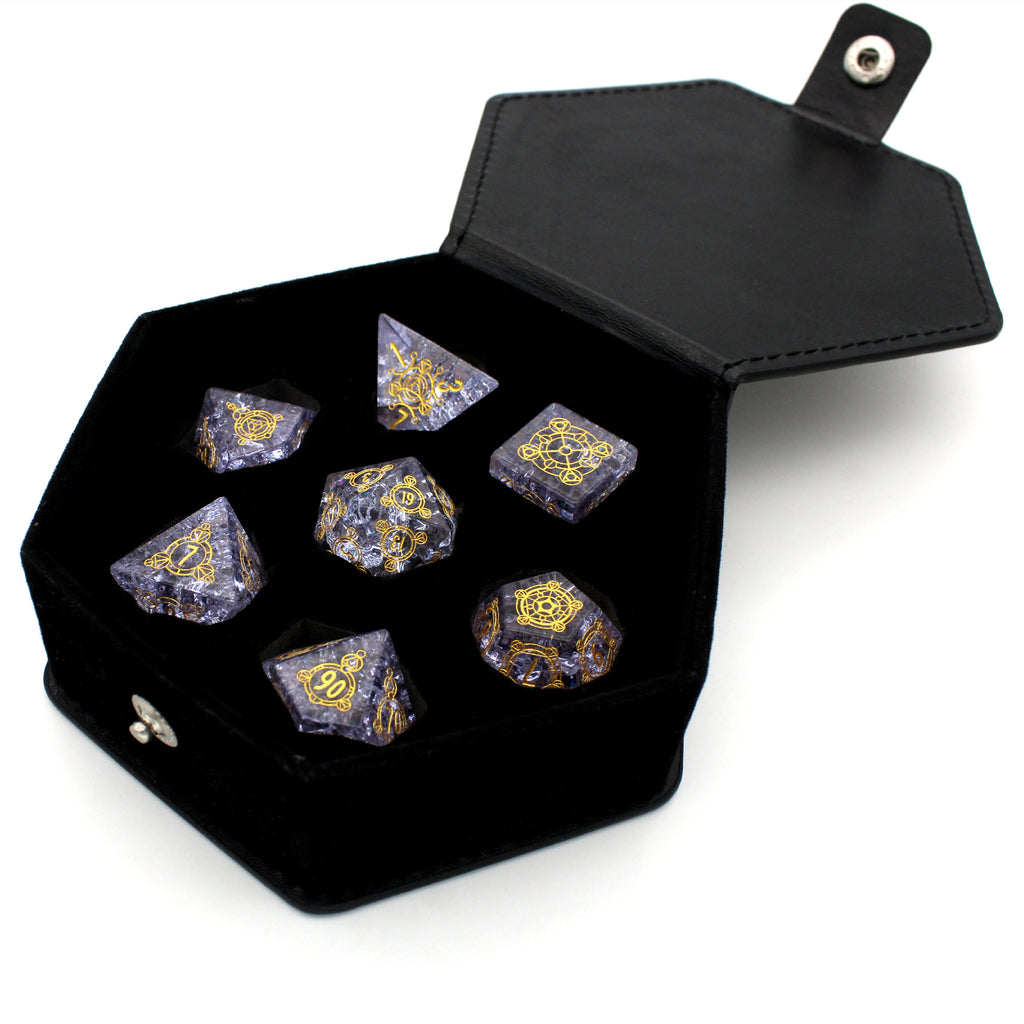 Annwn is a 7-piece, misty-lavender crystal set with gold engraving from our exclusive Sigil Collection.
