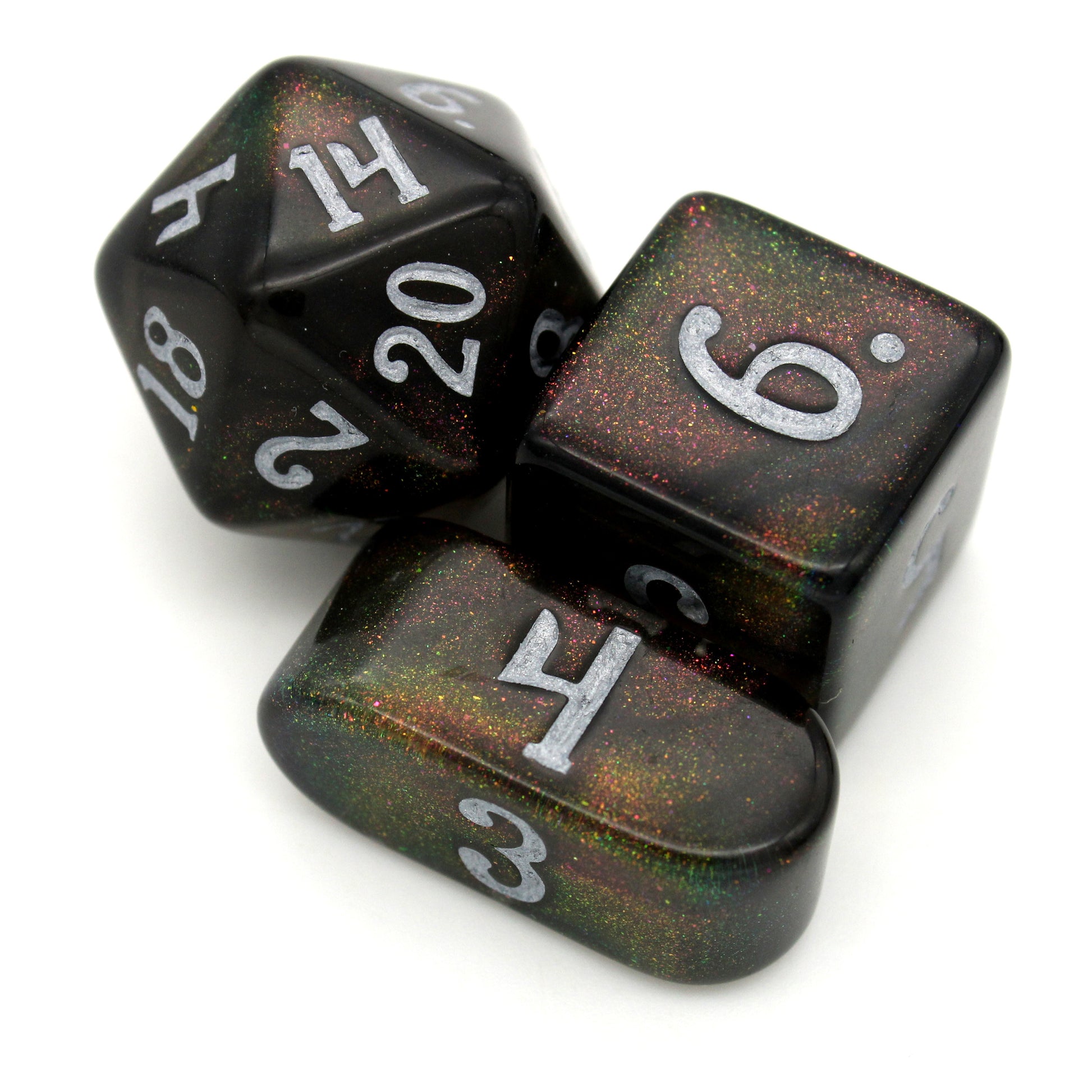 Archfeylien is a 10-piece set of acrylic dice featuring spacey, color-shifting microglitter, inked in white.