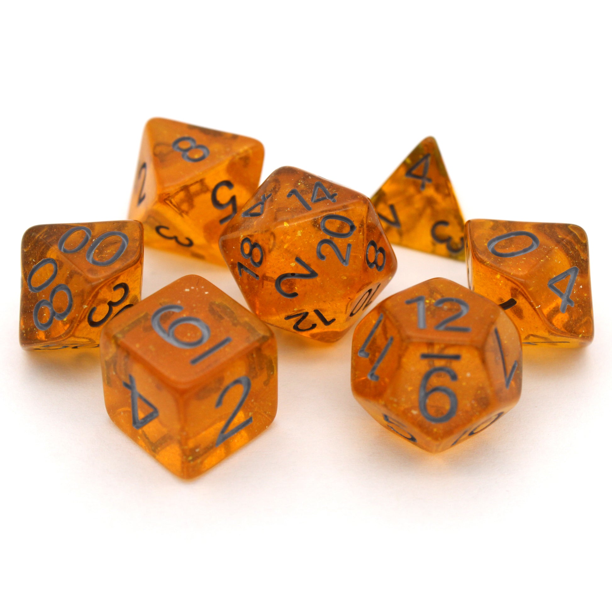 Bits-O-Honey is a 7-piece, 13mm polymer set of transparent amber resin dice, shimmering with silvery glitter and inked in dark grey. It belongs to our tiny but mighty Wee Lads collection. Standard d20 pictured for scale.