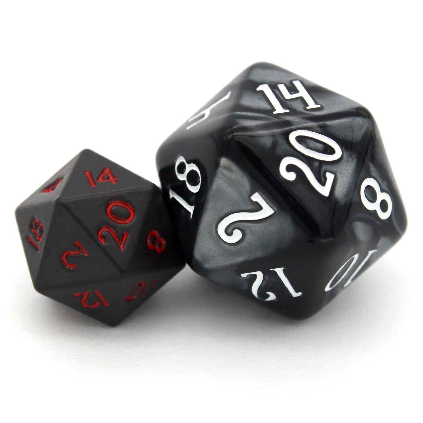 Bloodsuckers is a 7-piece set of matte, black colored 10mm metal dice with bright red inking.