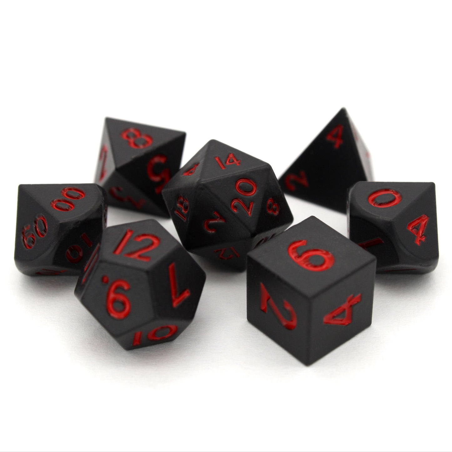 Bloodsuckers is a 7-piece set of matte, black colored 10mm metal dice with bright red inking.