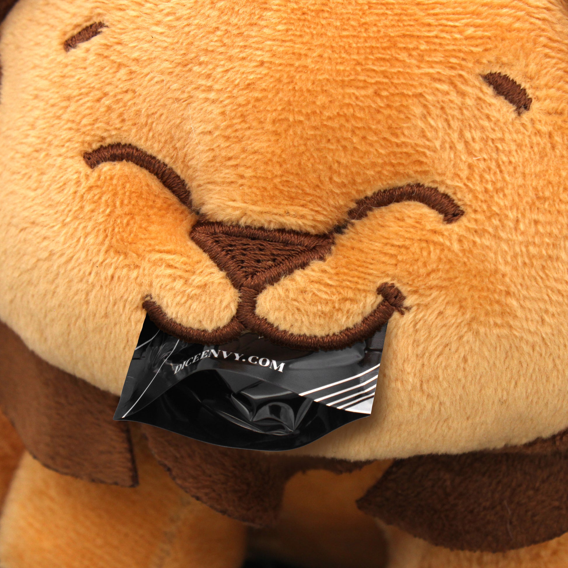 Each Brockton Plush Dice Bag now comes with a 10-piece Mystery set of polymer dice! Brockton himself is constructed from soft, satin-lined fabric and can hold a full 10-piece Dice Envy dice set (clearly). 6" x 6" x 6.5"