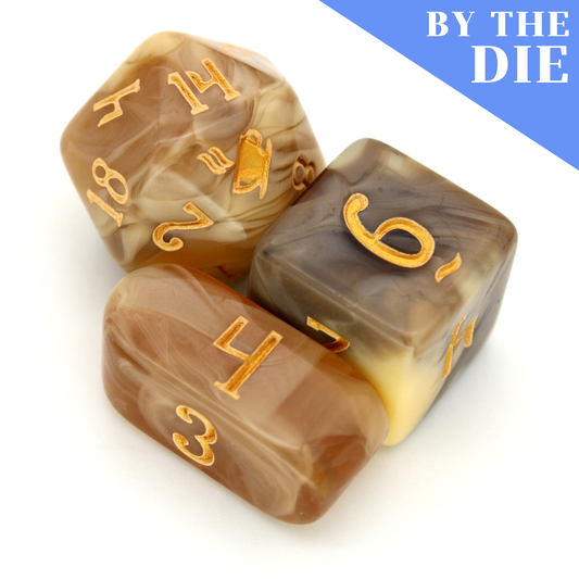 Caramel Cortados for Bad Kids (by the die) individual dice in our coffee mold feature swirling shades of caramel, brown, and inked in gold.