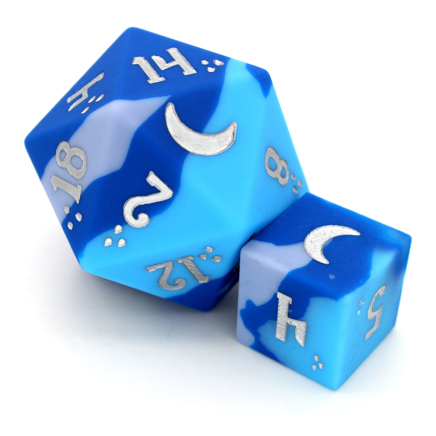 Chaotic Neutral is an 8-piece, swirled silicone dice set in bright blues and greys. It features a moonlit silver ink design.