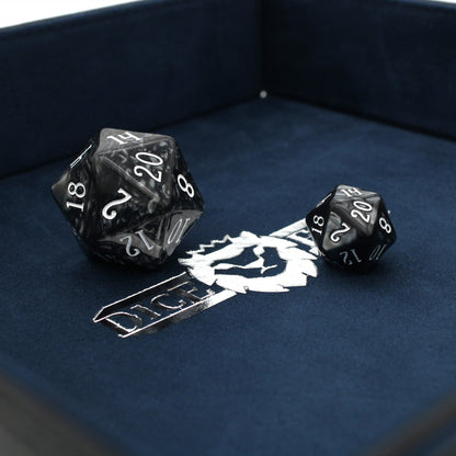 Made of vegan leather and microsuede, our dice trays have hidden magnets that hold them together and are available in druid green, warlock purple, barbarian tan, cleric blue, rogue red, and necromancer black.