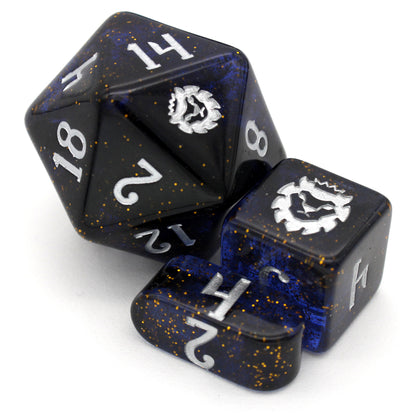 Court of Fireflies is a 10-piece, dark blue and black set of resin dice filled with gold glitter and inked in starry silver.