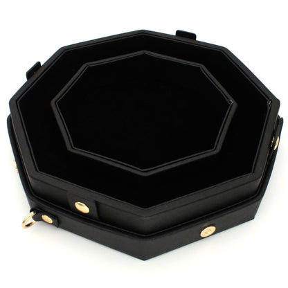 Made of black vegan leather and velvet, our Crossbody Dice Trays are deep enough to hold our Chonky d20s and have a removable strap that adjusts from 38" to 70" long.