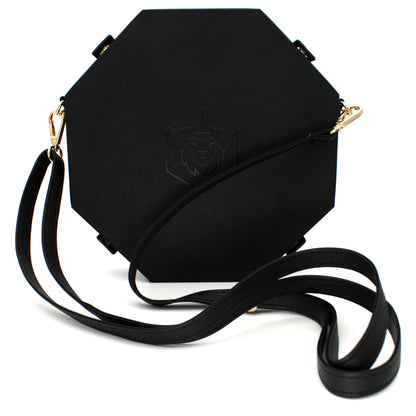 Made of black vegan leather and velvet, our Crossbody Dice Trays are deep enough to hold our Chonky d20s and have a removable strap that adjusts from 38" to 70" long.