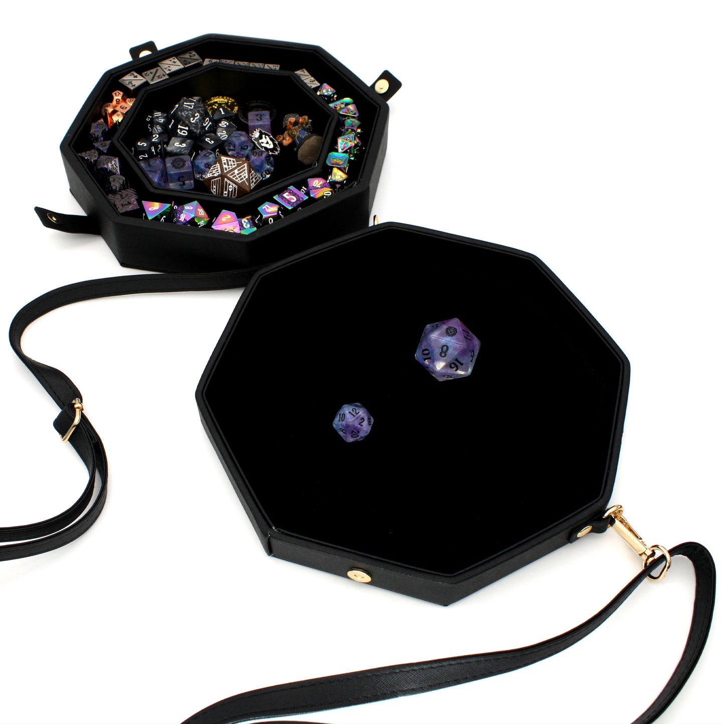 Made of black vegan leather and velvet, our Crossbody Dice Trays are deep enough to hold our Chonky d20s and have a removable strap that adjusts from 38" to 70" long.