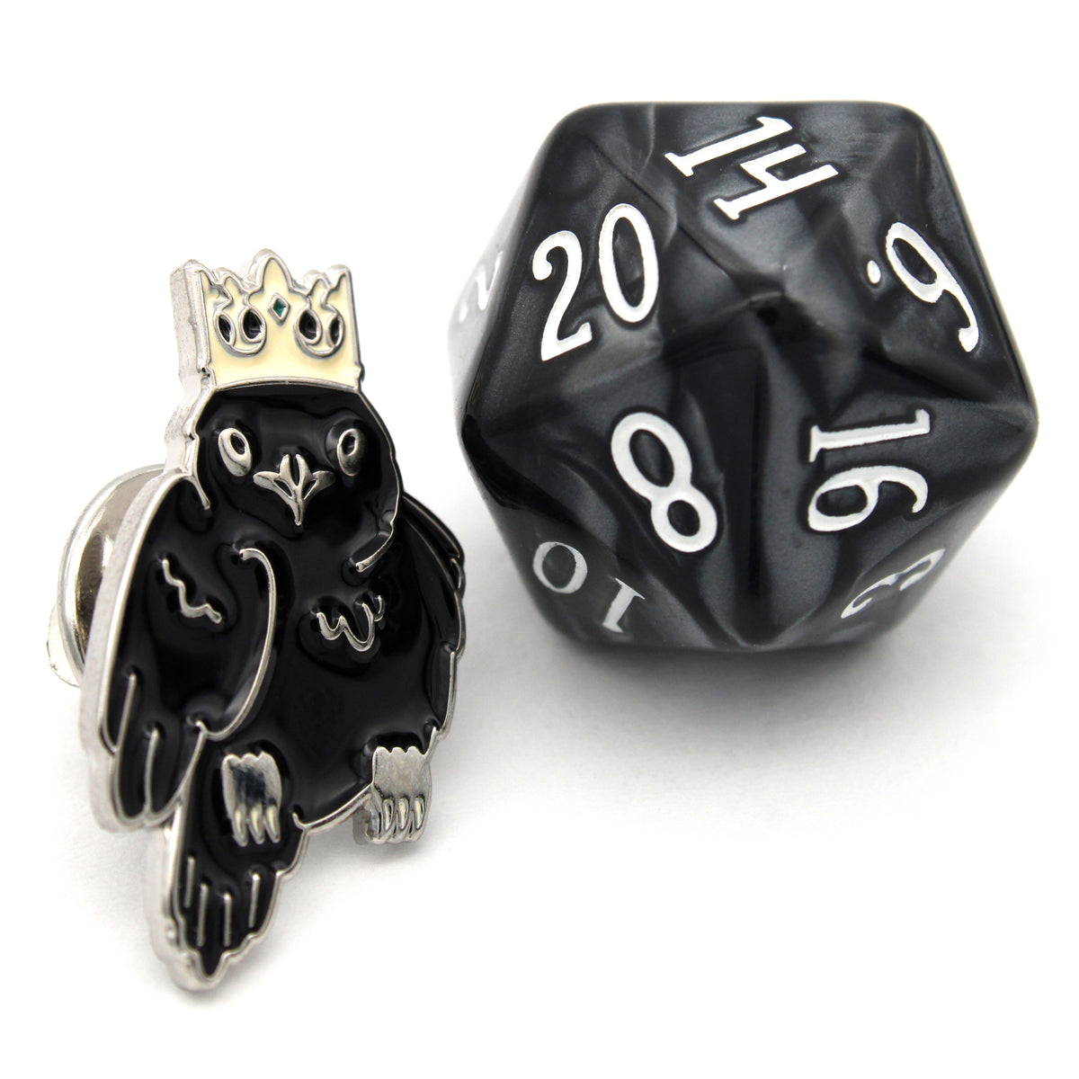 Crow-ned Pins measure 16mm x 25mm and come with a metal clutch backing.