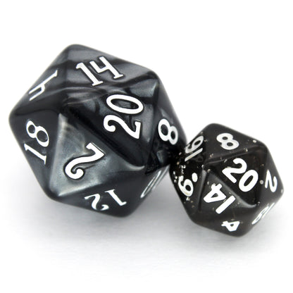 D'vination is a 7-piece 13mm resin dice set in transparent black with silver glitter, inked in white.