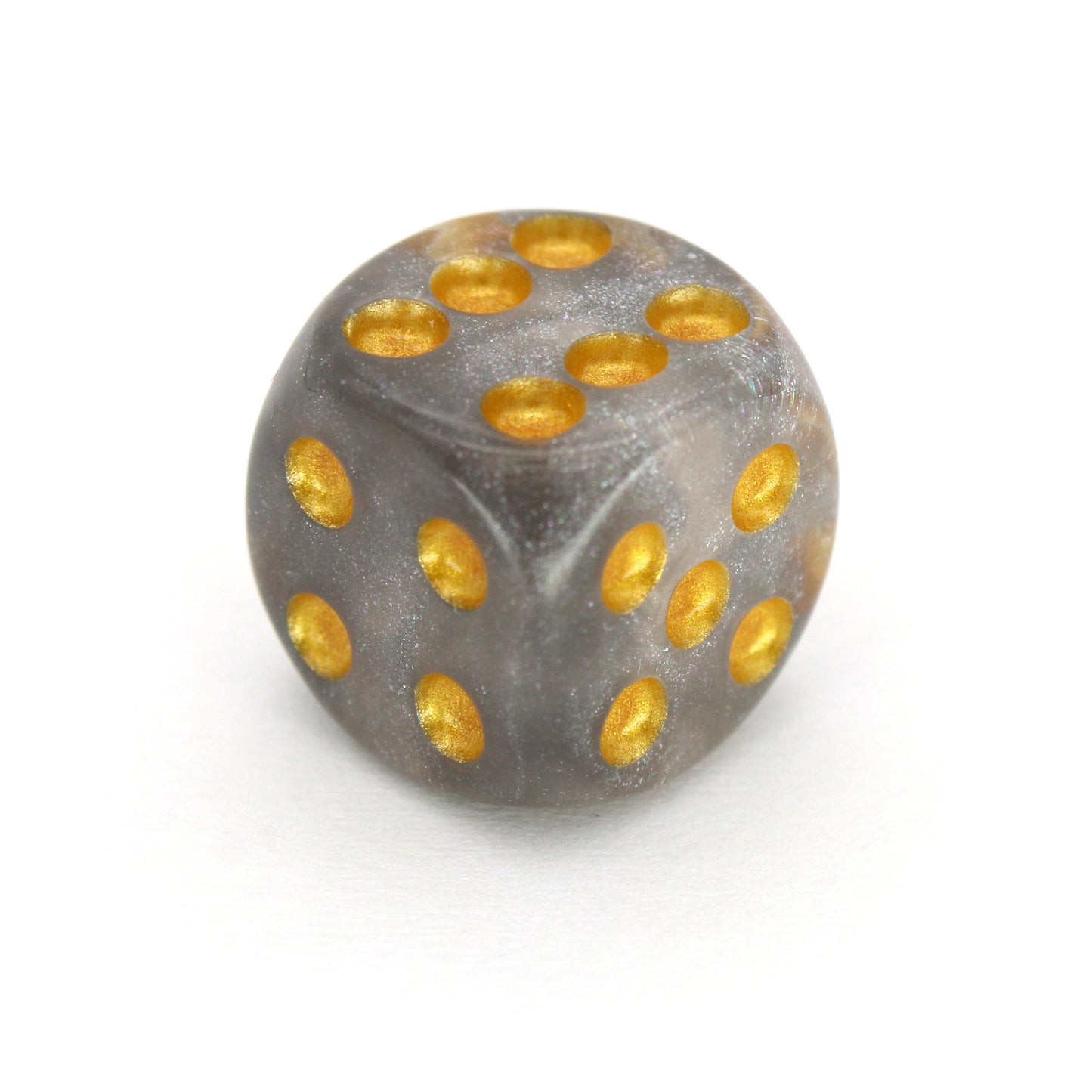 Daybreak is a 10-piece set of shimmering slivery-grey 12mm d6s, with pips inked in gold. They are part of our&nbsp;Pip-Squeaks collection.