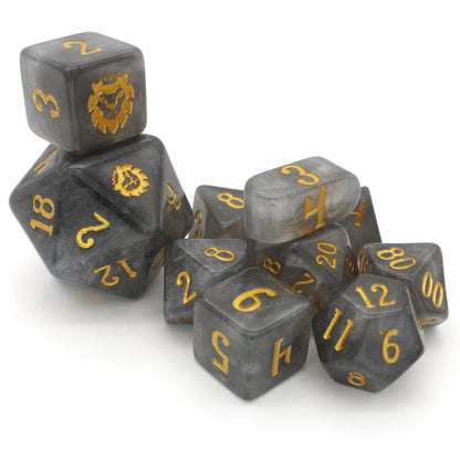 Daybreak is a 10-piece set of shimmering, silvery, grey acrylic dice, inked in gold.