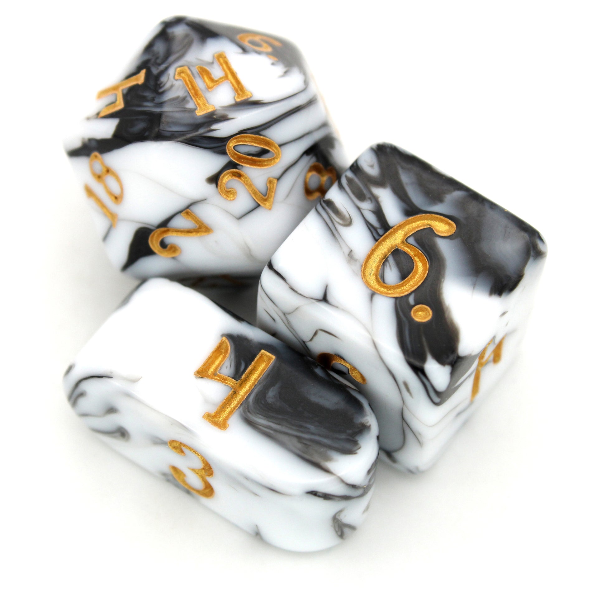 DLucks is a 10-piece, black and white swirled acrylic set with gold ink.