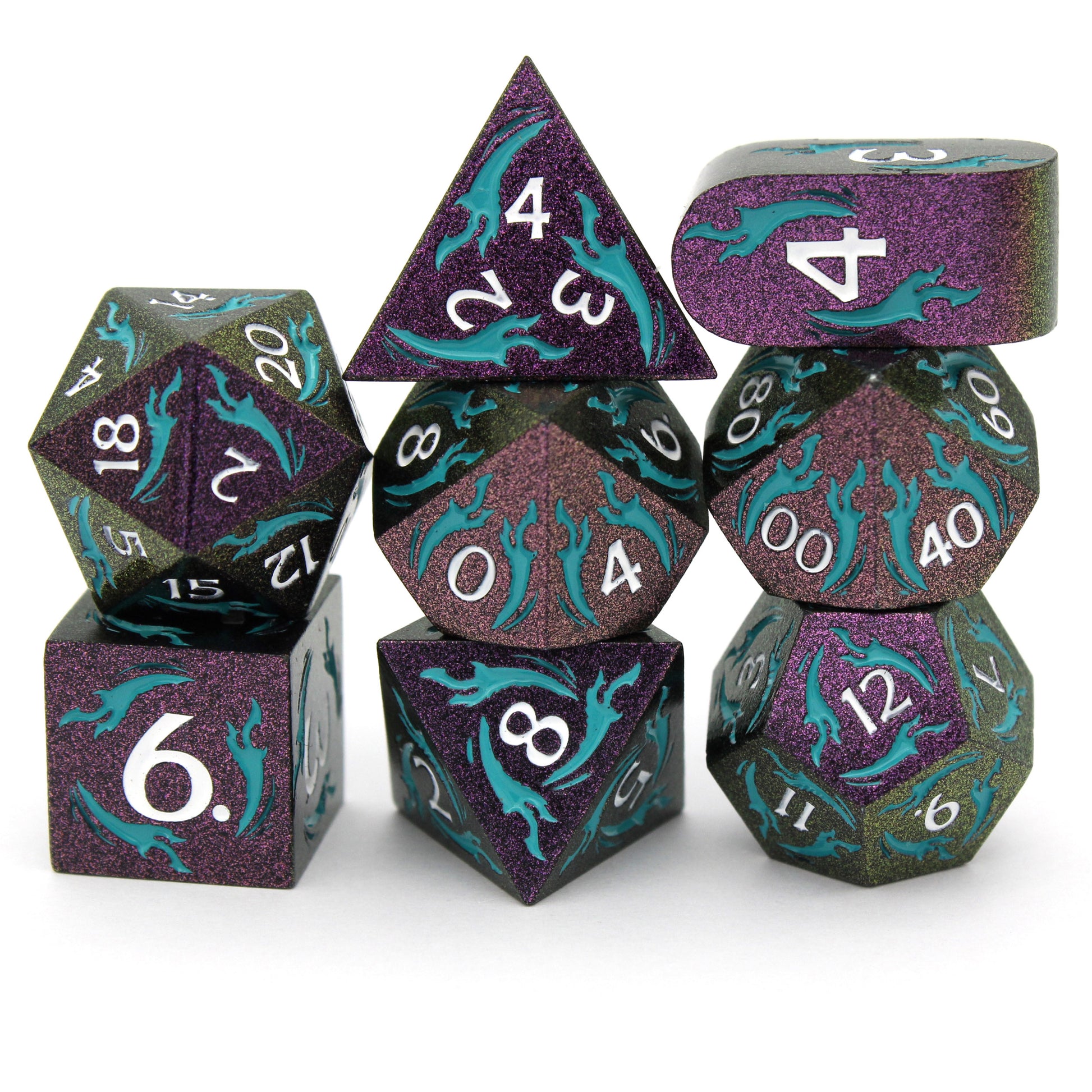 Doomspace is an 8-piece metal set in color-shifting purple-green with tendrils of teal enamel, inked in white.