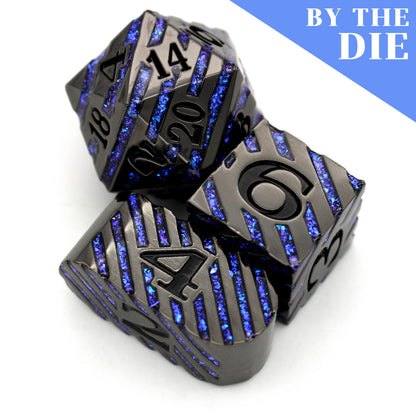 Edge Boss (by the die) individual dice are black metal dice banded in a wraparound enamel fill of glittering blue.