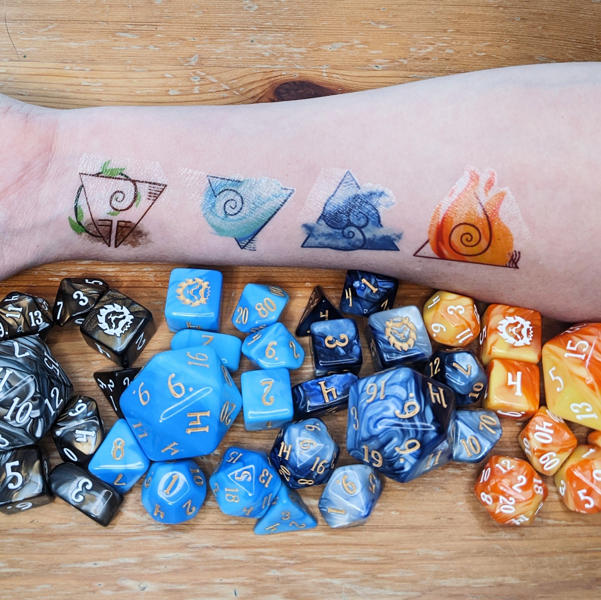 The Elemental Adept Bundle comes with four 10-piece Signature sets: FIREBALL, Shape Water, Air Apparent, and Earthquake, plus a temporary tattoo so you can show off your bending skills!