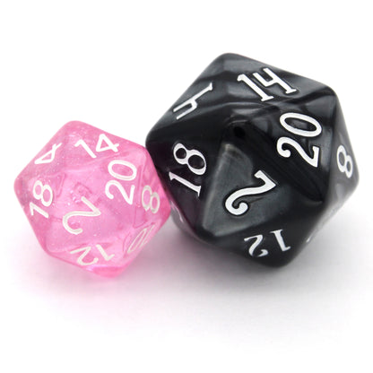 Fairy Dust is a 7-piece, 13mm polymer set of transparent pink resin dice, shimmering with silvery glitter and inked in bright white. It belongs to our tiny but mighty Wee Lads collection.