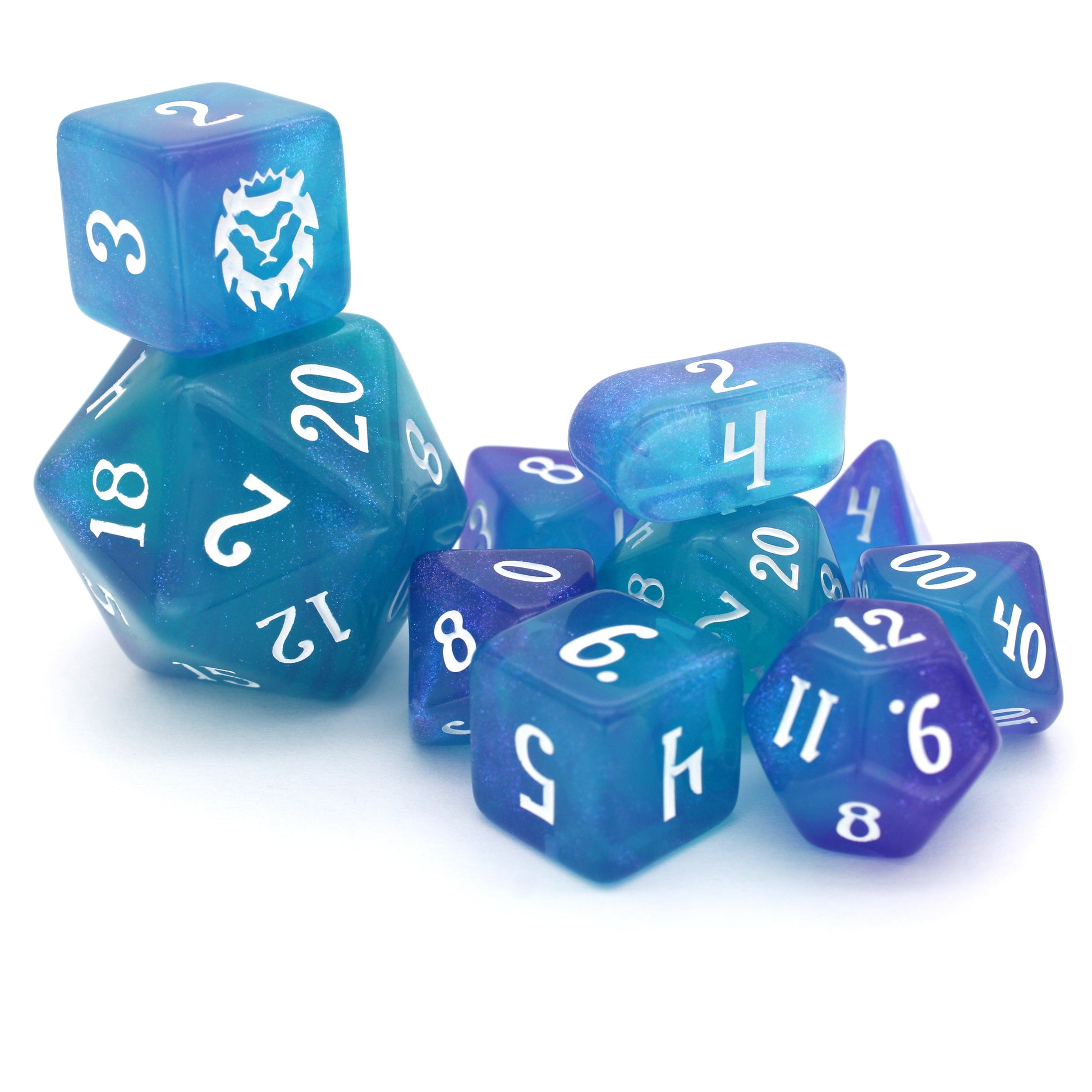 Favored Anemone is a 10-piece set of ocean blue resin dice with a splash of shimmering purple, inked in white.