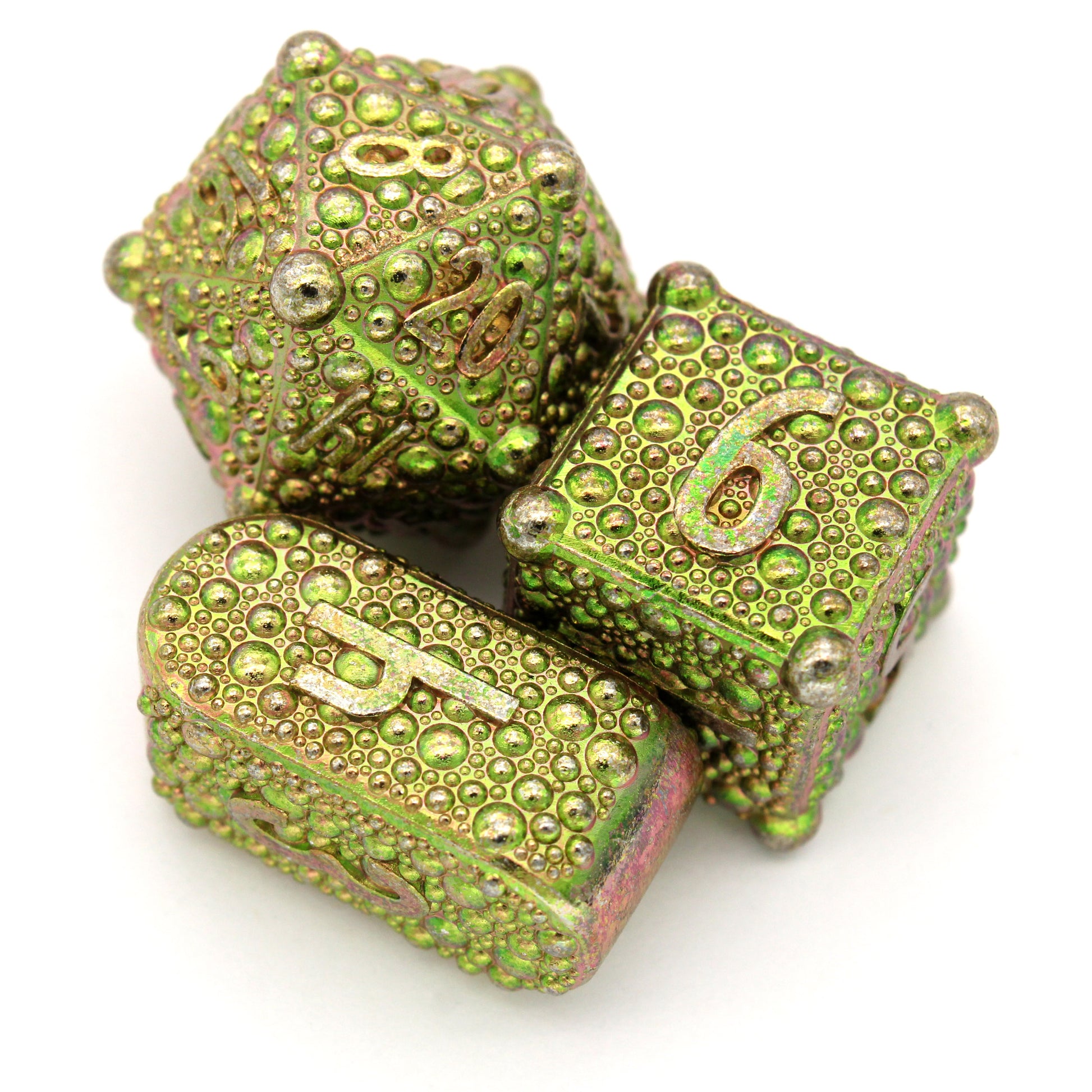 Fizbang is an 8-piece Dice Envy Original metal set in color shifting, green-to-orange, anodized zinc.