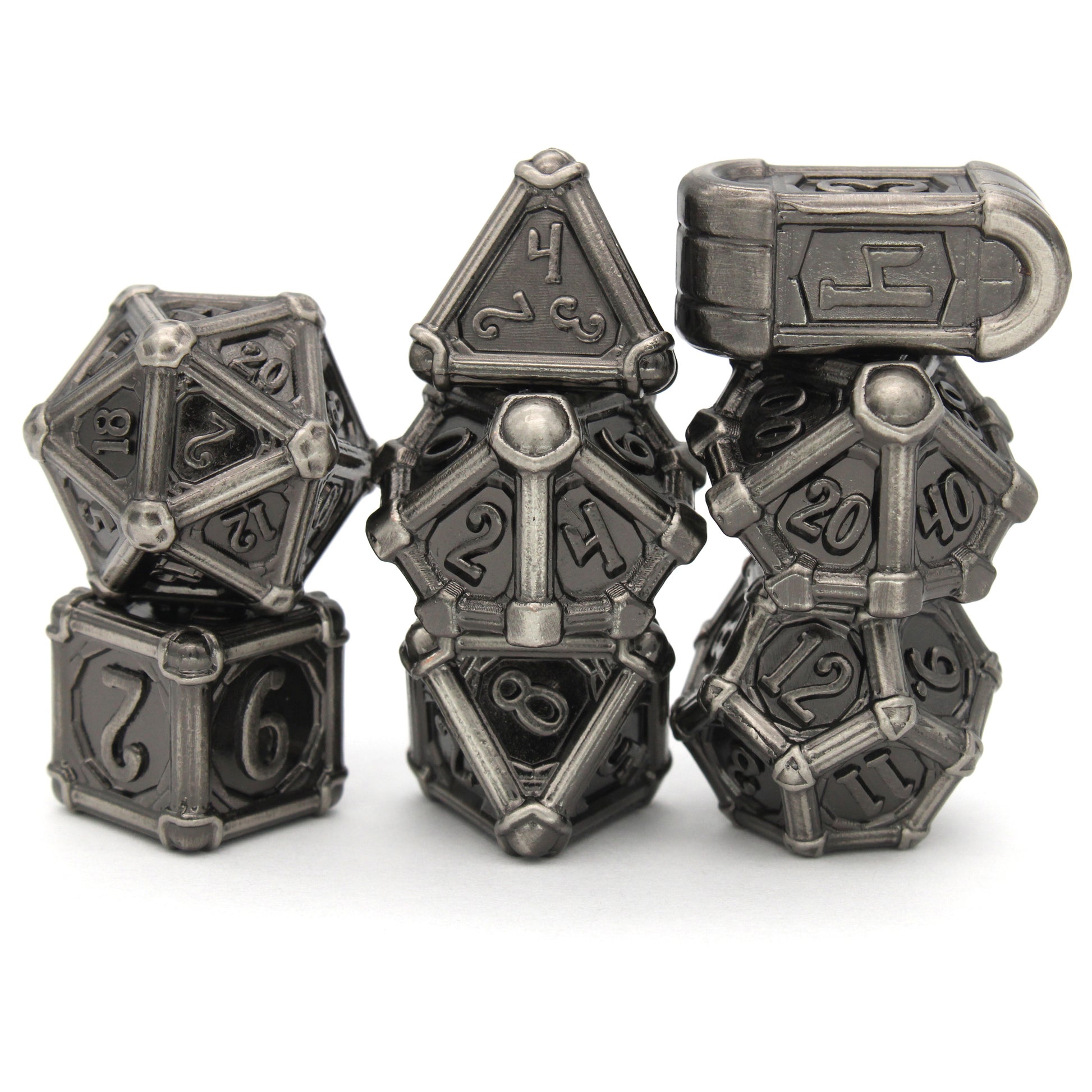 Fors Fortuna is an 8-piece Dice Envy Original set of ancient silver colored metal dice in our Colonnade mold.