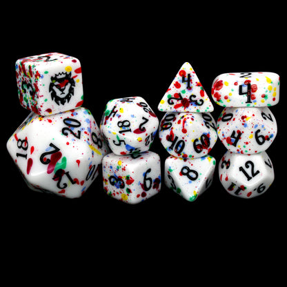 Gobbostopper is a 10-piece white acrylic set with black ink and red, blue, yellow, and green splatters. Please do not eat the dice, goblin or not!
