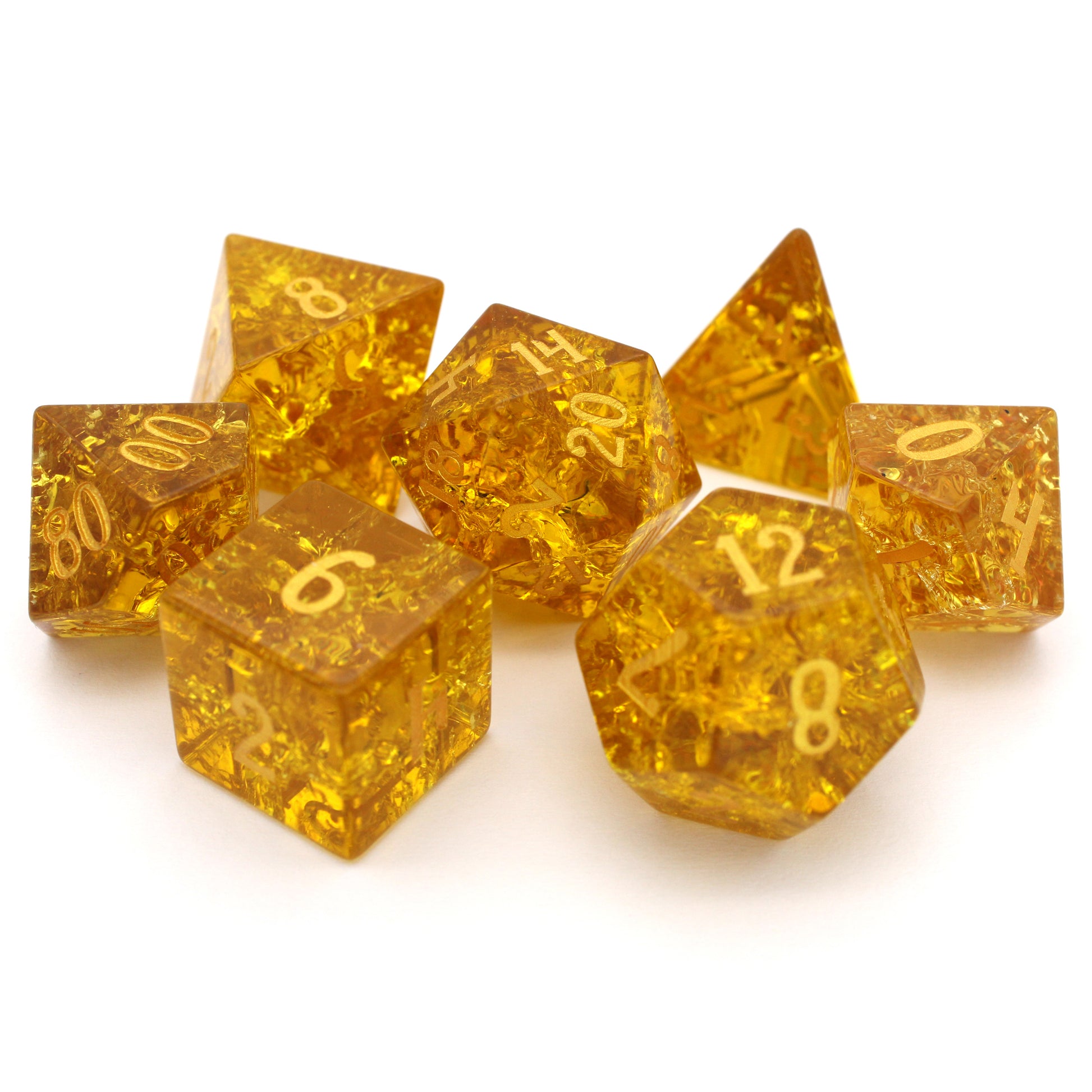 Golden Hour is a 7-piece set of amber crystal dice with a crackle effect and gold numbering.