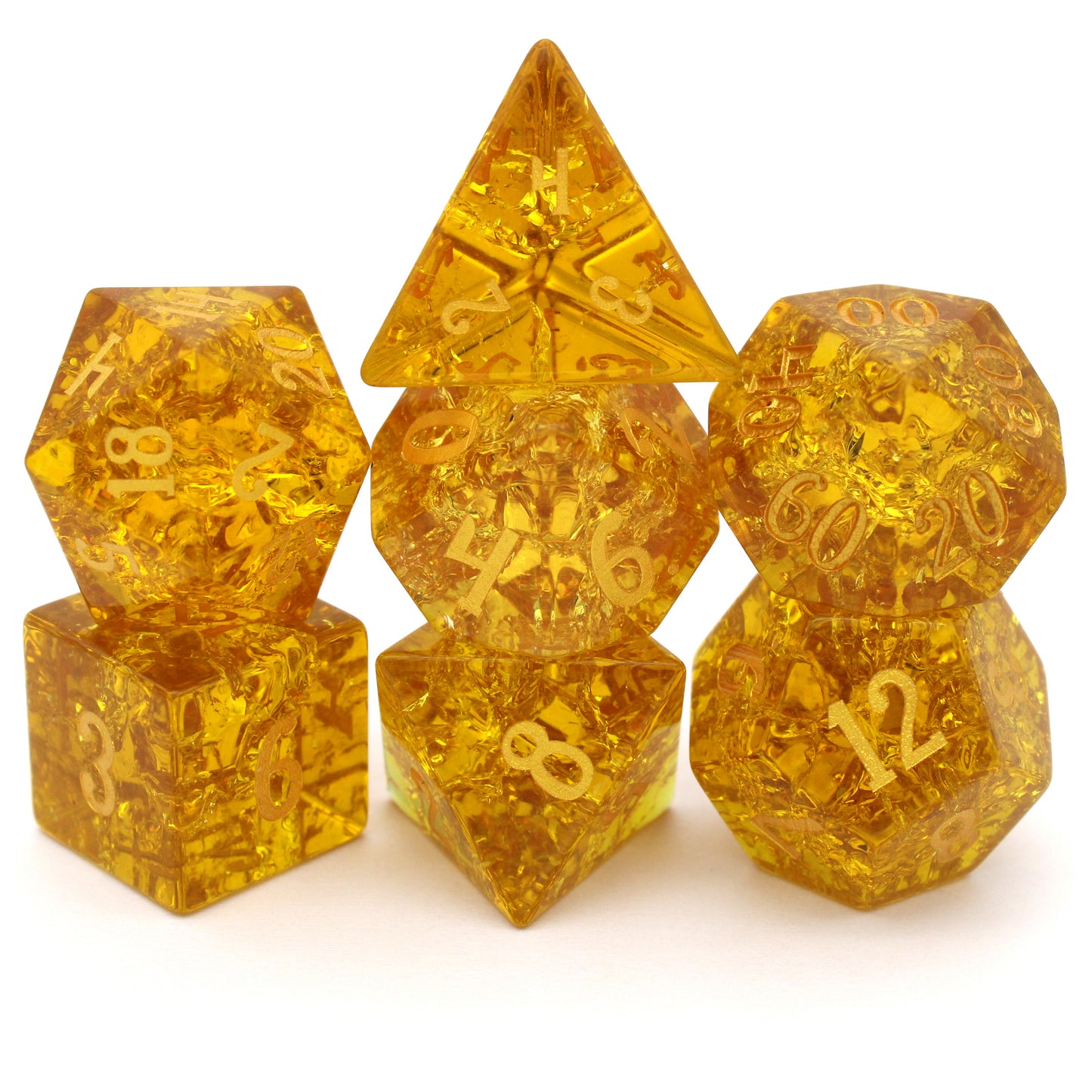 Golden Hour is a 7-piece set of amber crystal dice with a crackle effect and gold numbering.