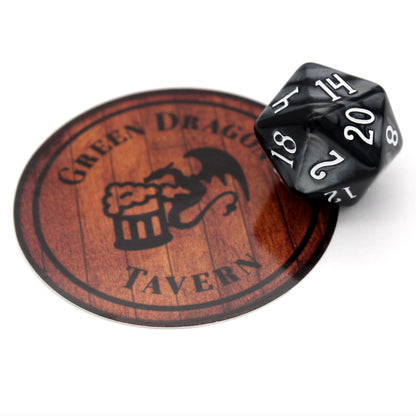 Dice Envy Stickers are generally between 2" and 4" long and feature D&D and TTRPG inspired designs, as well as variations on our mascot Brockton, ranging from delightful to disconcerting.
